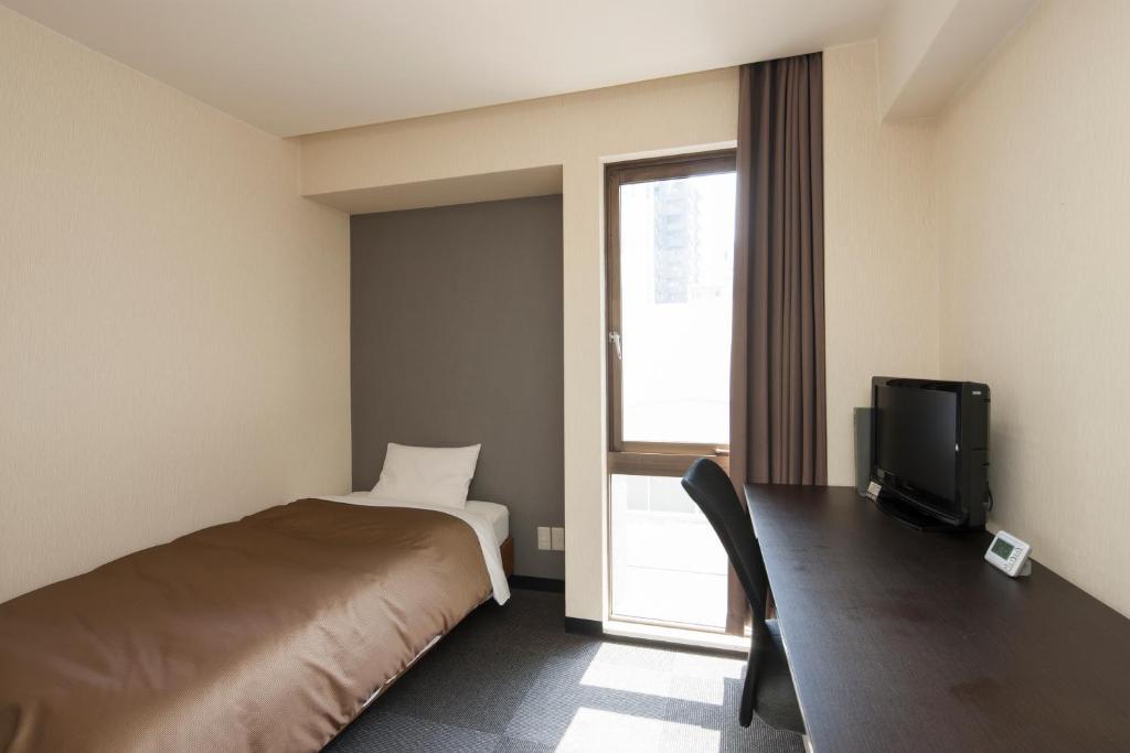 Hotel Plaza Inn Tokusima Szoba fotó